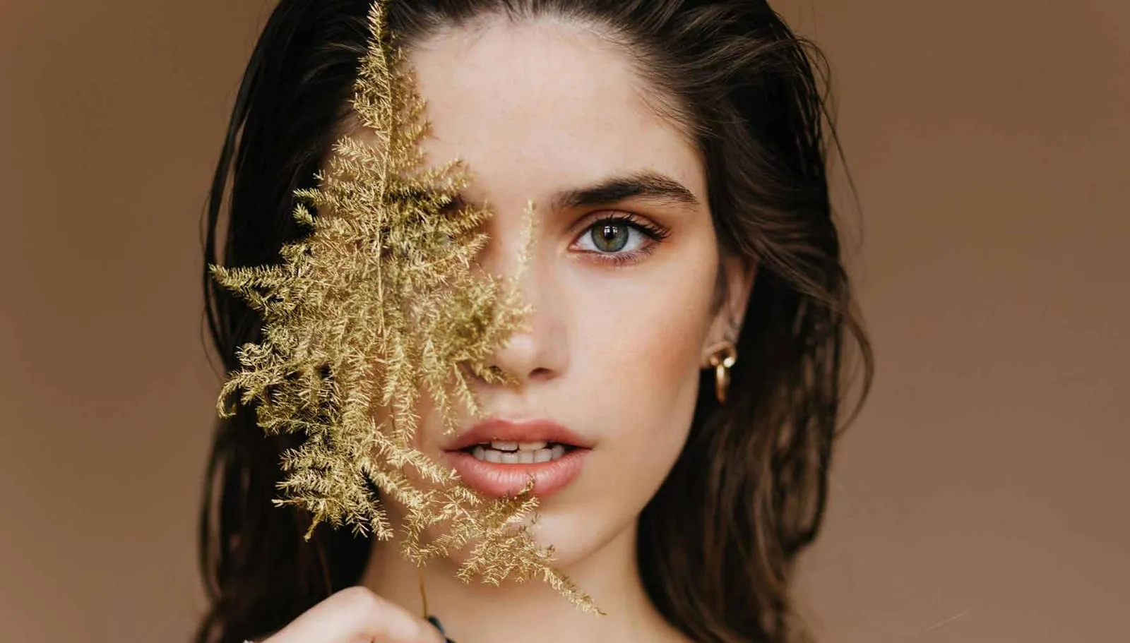 Model with gold foliage from the Family Color campaign