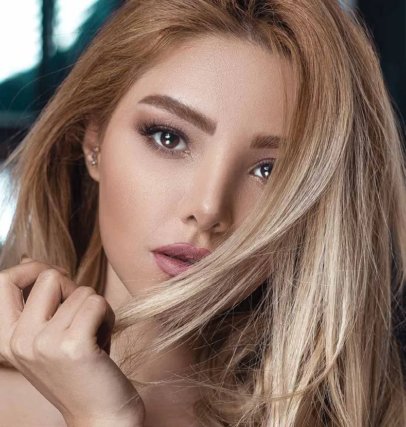 Honey blonde with face-framing pieces